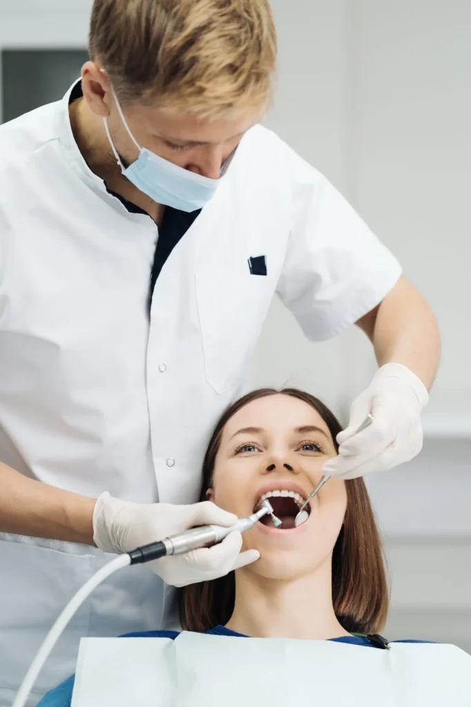 Female patient undergoing dental examination for preventative dentistry in Chicago.