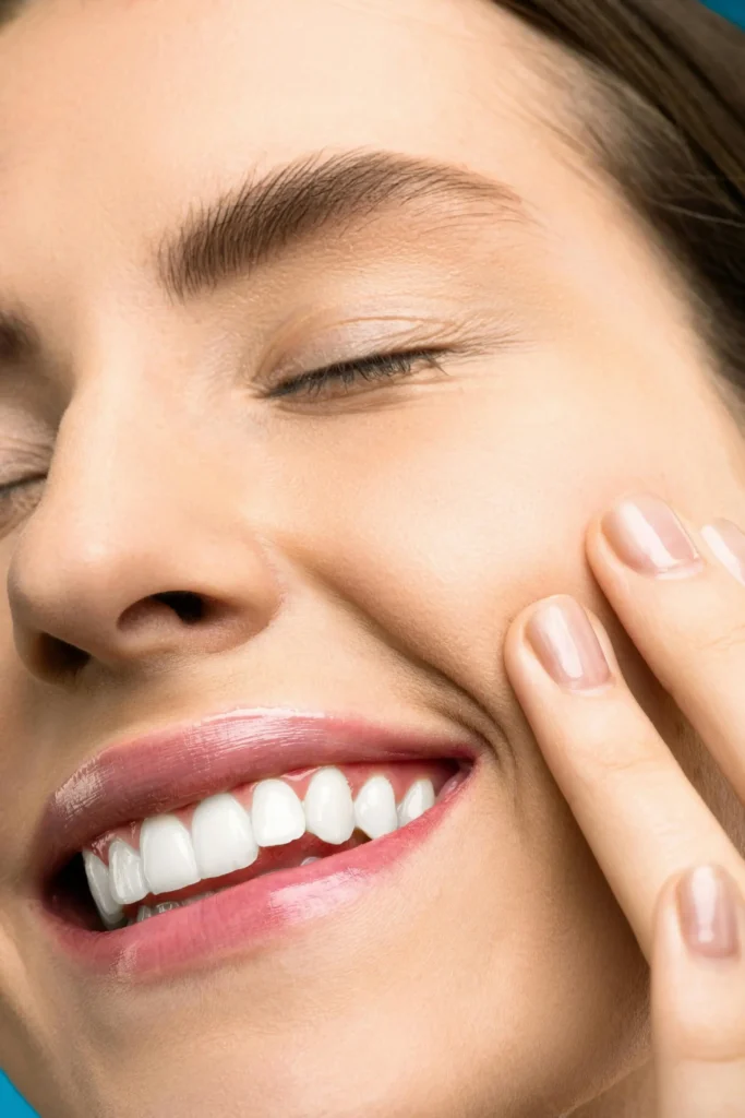 Smiling female patient after full mouth reconstruction treatment in Chicago.